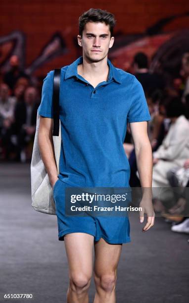 Model walks the runway at the Hermes: Dwtwn Men - s/s17 Runway Show on March 9, 2017 in Los Angeles, California.