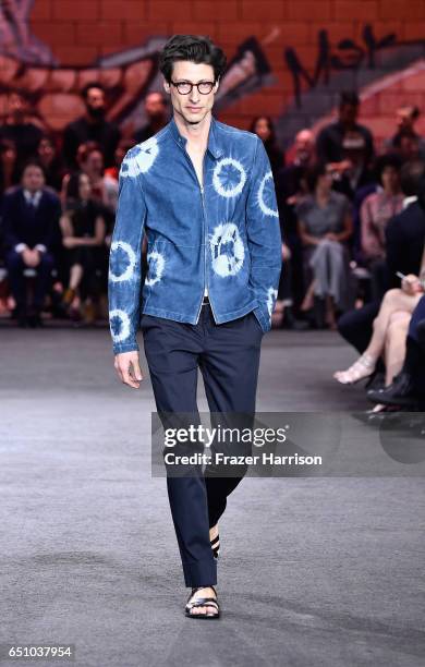 Model walks the runway at the Hermes: Dwtwn Men - s/s17 Runway Show on March 9, 2017 in Los Angeles, California.