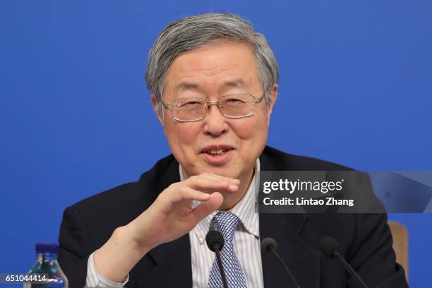 Zhou Xiaochuan, governor of the People's Bank of China, speaks during a press conference at the media center on March 10, 2017 in Beijing, China....