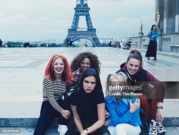English pop girl group The Spice Girls pose in front of the Eiffel Tower in Paris, September 1996. Clockwise, from left: Geri Halliwell , Melanie...