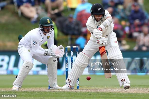 Trent Boult of New Zealand bats during day three of the First Test match between New Zealand and South Africa at University Oval on March 10, 2017 in...