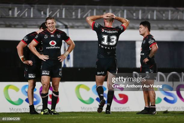 Ryan Hoffman of the Warriors and the team react after a Storms try during the round two NRL match between the New Zealand Warriors and the Melbourne...