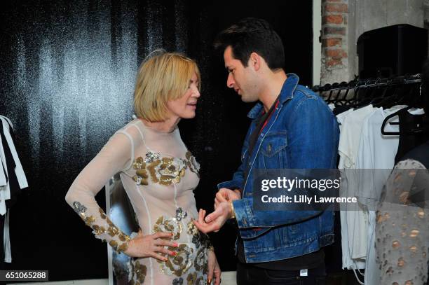 Artist Karen Bystedt and musician Mark Ronson attend Karen Bystedt's "Kings And Queens" exhibition on March 9, 2017 in Los Angeles, California.