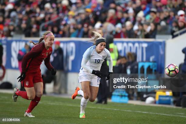 Toni Duggan of England challenged by Becky Sauerbrunn of United States during the USA Vs England SheBelieves Cup match at Red Bull Arena on March 4,...