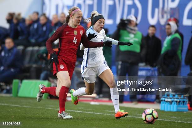 Toni Duggan of England challenged by Becky Sauerbrunn of United States during the USA Vs England SheBelieves Cup match at Red Bull Arena on March 4,...