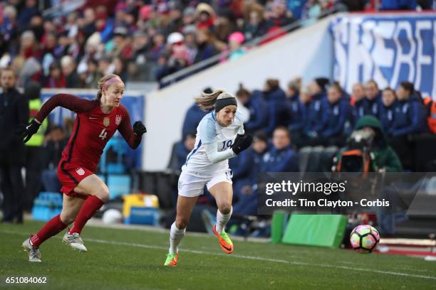 Toni Duggan of England challenged by Becky Sauerbrunn of United States during the USA Vs England SheBelieves Cup match at Red Bull Arena on March 4,...