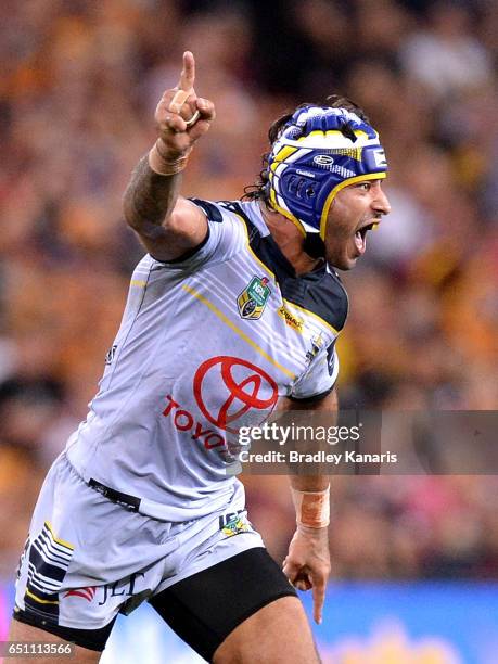 Johnathan Thurston of the Cowboys celebrates victory after kicking the winning field goal in golden point exra time during the round two NRL match...