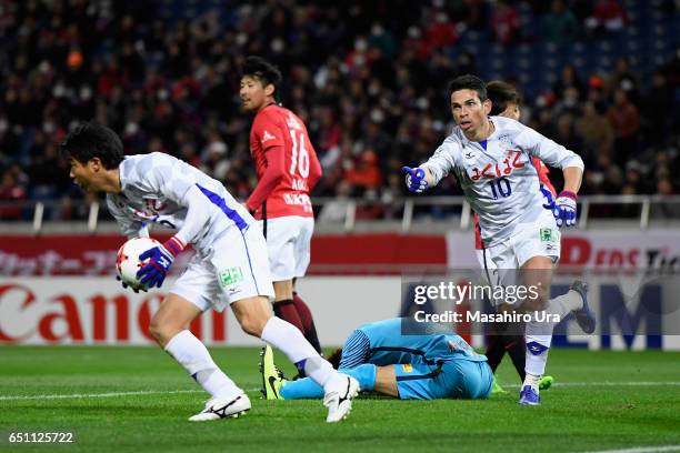 Dudu of Ventforet Kofu celebrates scoring his side's first goal during the J.League J1 match between Urawa Red Diamonds and Ventforet Kofu at Saitama...