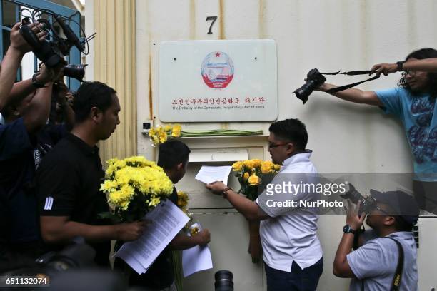 Solidarity Ajak Muda Malaysia send a yellow daisy flowers as a symbol of friendships between Malaysia and North Korea in front of the North Korea...