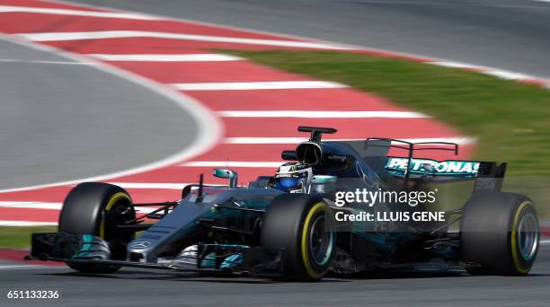 Mercedes' Finnish driver Valtteri Bottas drives at the Circuit de Catalunya on March 10, 2017 in Montmelo on the outskirts of Barcelona on the fourth...