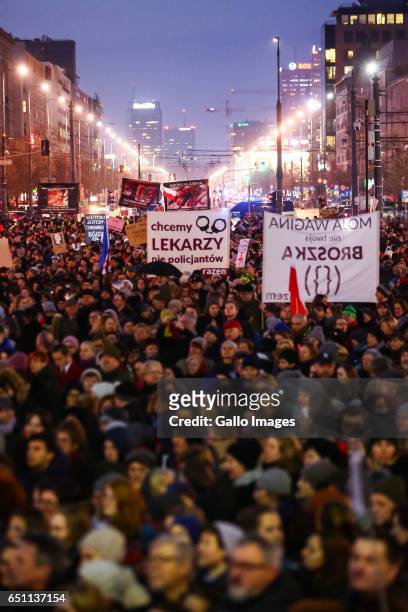 Thousands of people participate in the Miedzynarodowy Strajk Kobiet on March 08, 2017 in Warsaw, Poland. IWS is an initiative established by womens...