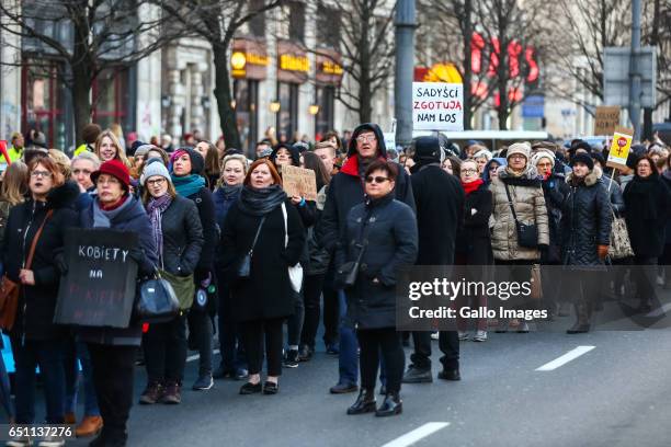 Thousands of people participate in the Miedzynarodowy Strajk Kobiet on March 08, 2017 in Warsaw, Poland. IWS is an initiative established by womens...