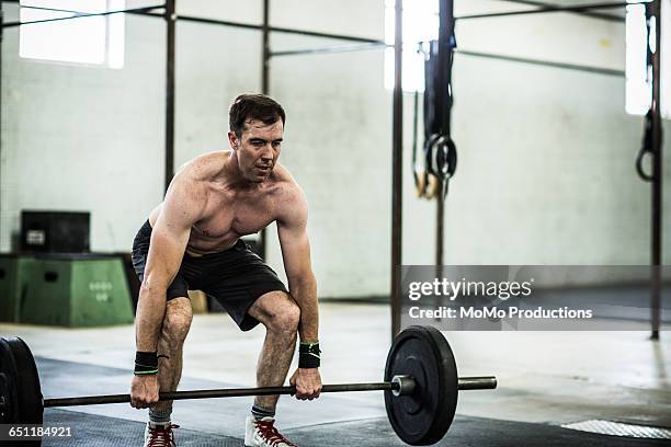 gym - man lifting weights - deadlift stock pictures, royalty-free photos & images