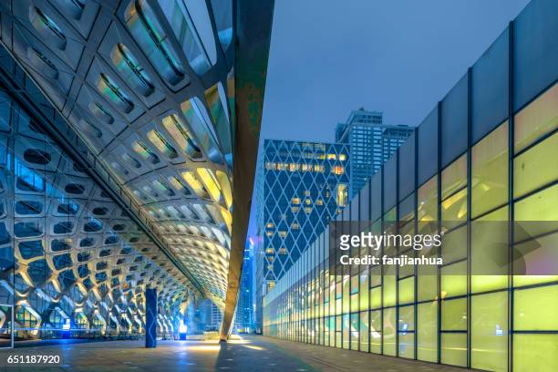 modern architecture in empty city square - office building entrance night stock pictures, royalty-free photos & images