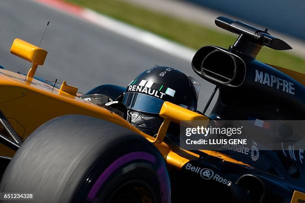 Renault's German driver Nico Hulkenberg drives at the Circuit de Catalunya on March 10, 2017 in Montmelo on the outskirts of Barcelona on the fourth...