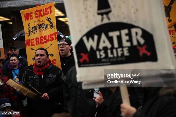 Activists gather outside the Army Corps of Engineers Office to protest against the Dakota Access Pipeline March 10, 2017 in Washington, DC. The...