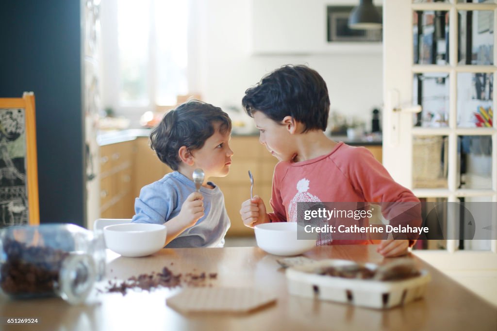 2 brothers having their breakfast