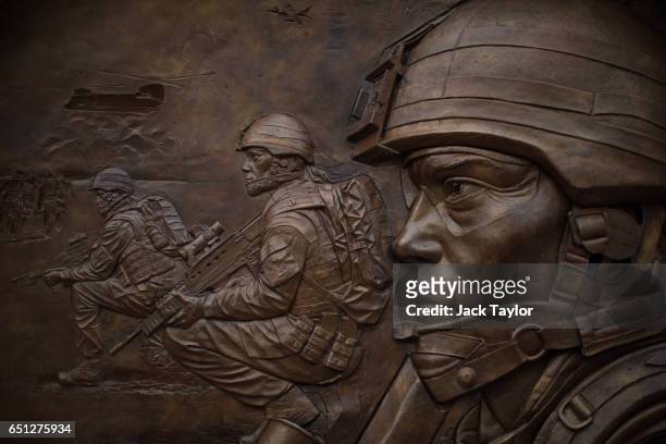 Detail view of the new Iraq and Afghanistan wars memorial in Victoria Embankment Gardens on March 10, 2017 in London, England. The sculpture by...