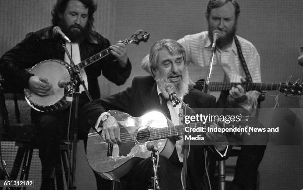 At the 25th Year celebration of The Dubliners on The Late Late Show, Ronnie Drew, Barney McKenna and Sean Cannon, Dublin, .
