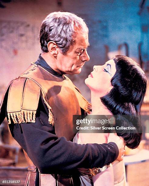 Actress Elizabeth Taylor as the famed Egyptian queen and actor Rex Harrison as Julius Caesar in the historical epic 'Cleopatra', 1963.