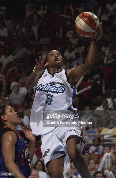 Elaine Powell of the Orlando Miracle goes to the basket during the game against the Detroit Shock at TD Waterhouse Centre in Orlando, Florida on May...