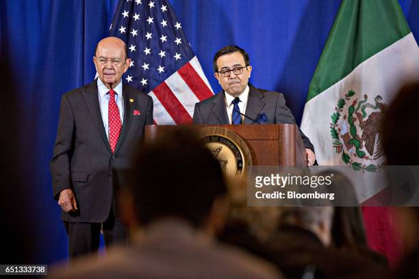 Ildefonso Guajardo Villarreal, secretary of economy for Mexico, speaks as Wilbur Ross, U.S. Secretary of commerce, left, listens during a news...