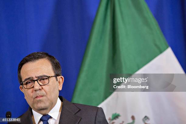 Ildefonso Guajardo Villarreal, secretary of economy for Mexico, listens during a news conference with Wilbur Ross, U.S. Secretary of commerce, not...