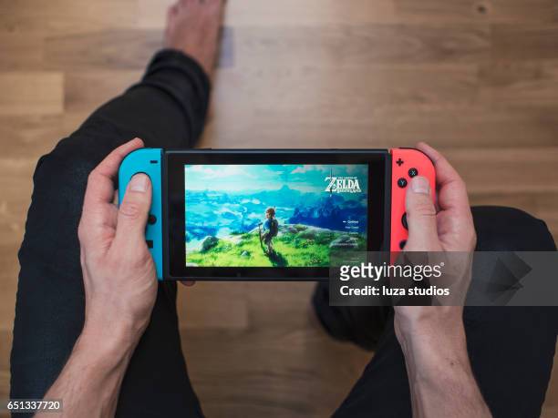 nintendo switch neon game console - nintendo stock pictures, royalty-free photos & images