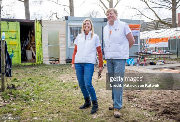 King Willem-Alexander and Queen Maxima of the Netherlands volunteering for NL Doet in the neighborhood garden on March 10, 2017 in Breda,...