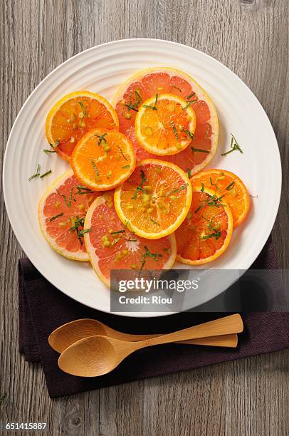 citrus fruit carpaccio - carpaccio stock-fotos und bilder
