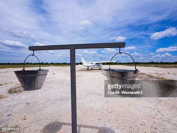 namibia, ongava wild reservat, cessna, scales for baggage in the foreground - namibia airplane stock pictures, royalty-free photos & images