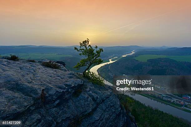 germany, saxony, saxon switzerland, elbe sandstone mountains, elbe river at sunset - saxony stock-fotos und bilder