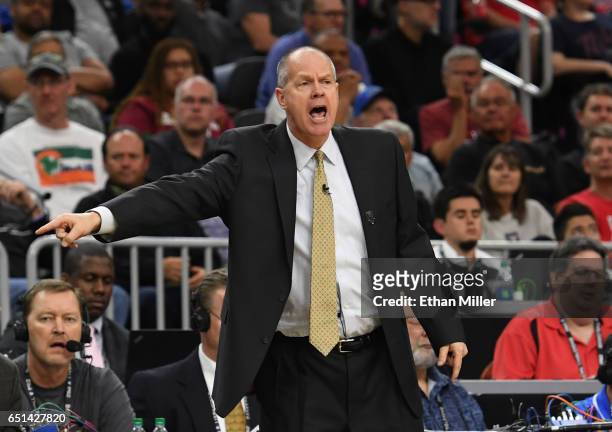 Head coach Tad Boyle of the Colorado Buffaloes reacts during a quarterfinal game of the Pac-12 Basketball Tournament against the Arizona Wildcats at...