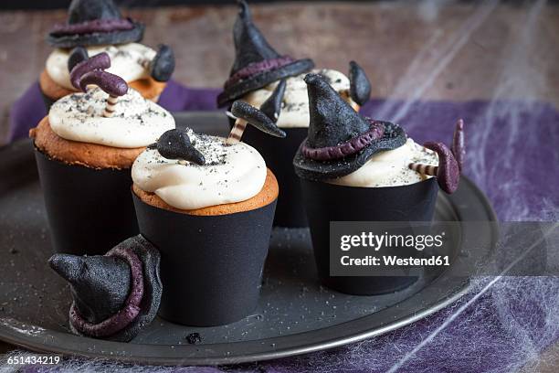 halloween cupcakes with crashed witches topping - halloween food stock pictures, royalty-free photos & images