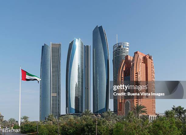 abu dhabi, the etihad towers. - uae flag stock pictures, royalty-free photos & images