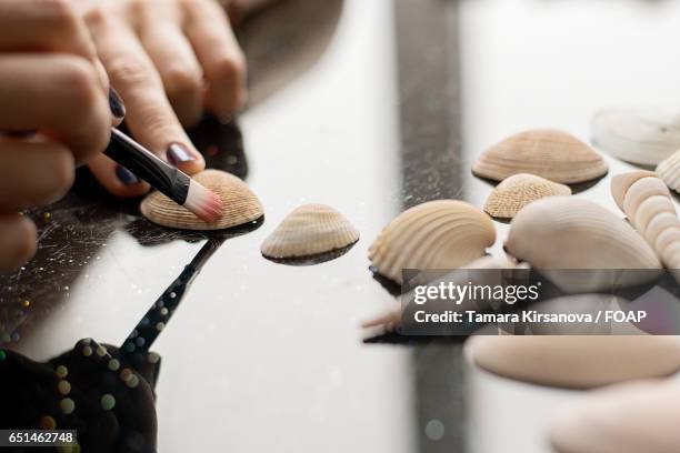 Hand Holding Conch Shell Photos and Premium High Res Pictures - Getty ...