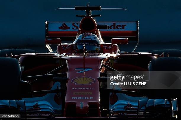 Ferrari's Finnish driver Kimi Raikkonen drives at the Circuit de Catalunya on March 10, 2017 in Montmelo on the outskirts of Barcelona on the fourth...