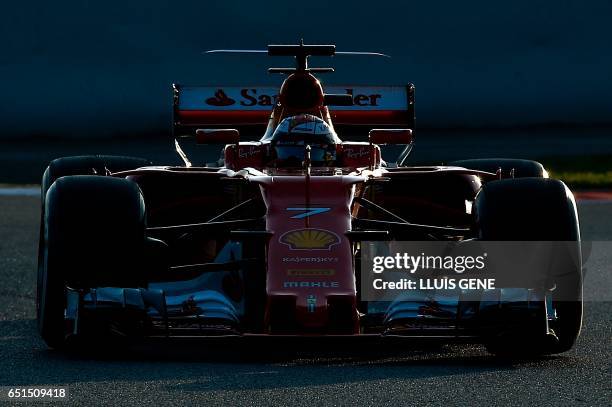 Ferrari's Finnish driver Kimi Raikkonen drives at the Circuit de Catalunya on March 10, 2017 in Montmelo on the outskirts of Barcelona on the fourth...