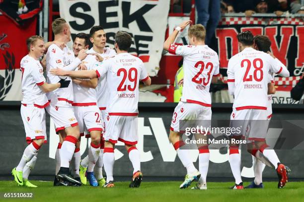 Sebastian Polter of Berlin celebrates his team's first goal with team mates during the Second Bundesliga match between FC St. Pauli and 1. FC Union...