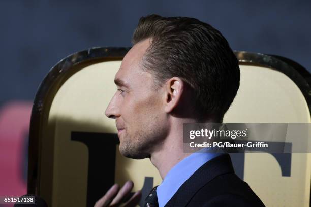 Tom Hiddleston is seen arriving at the premiere of Kong: Skull Island on March 08, 2017 in Los Angeles, California.