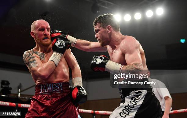 Antrim , United Kingdom - 10 March 2017; Gary Corcoran, right, in action against James Gorman during their welterweight bout in the Waterfront Hall...