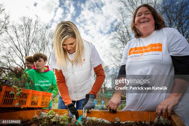 Queen Maxima of the Netherlands volunteering for NL Doet in the neighborhood garden on March 08, 2017 in Breda, Netherlands. NL Doet is a National...