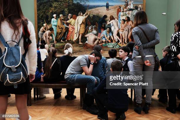 Russian teens visit the Tretyakov Gallery in Moscow on March 10, 2017 in Moscow, Russia. Relations between the United States and Russia are at their...