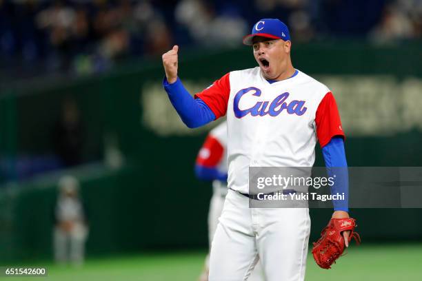 Miguel Lahera of Team Cuba reacts after striking out Brad Harman of Team Australia to win Game 5 of Pool B of the 2017 World Baseball Classic at the...