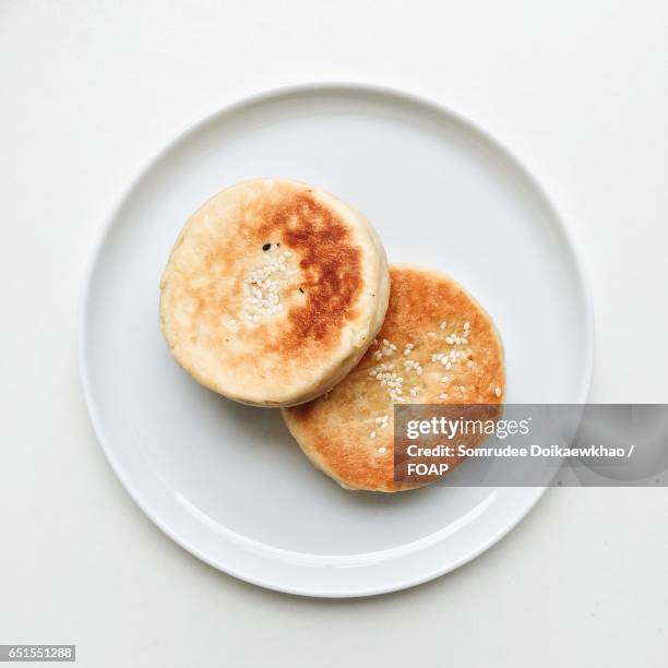 sweet potato pancakes on a white plate. - sweet potato pancakes stock pictures, royalty-free photos & images