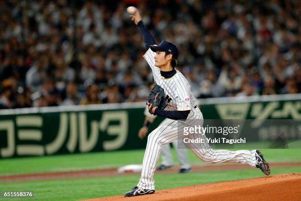 Shota Takeda of Team Japan pitches in the first inning during Game 6 of Pool B against Team China at the Tokyo Dome on Friday, March 10, 2017 in...