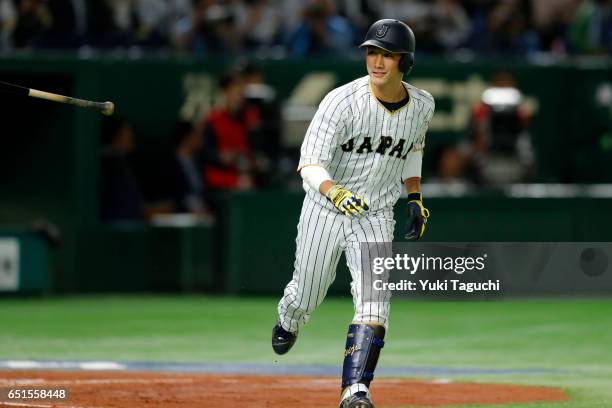 Seiji Kobayashi of Team Japan hits a two-run home run in the second inning during Game 6 of Pool B against Team China at the Tokyo Dome on Friday,...