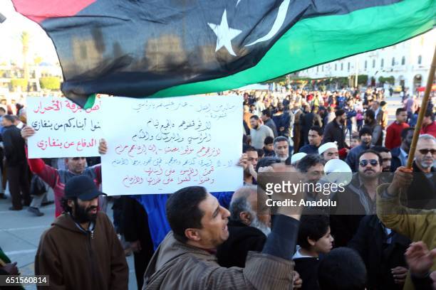 Libyans take part in a protest against operation named 'Dignity' held by Commander in the Libyan National Army Marshal Khalifa Haftar in Tripoli,...