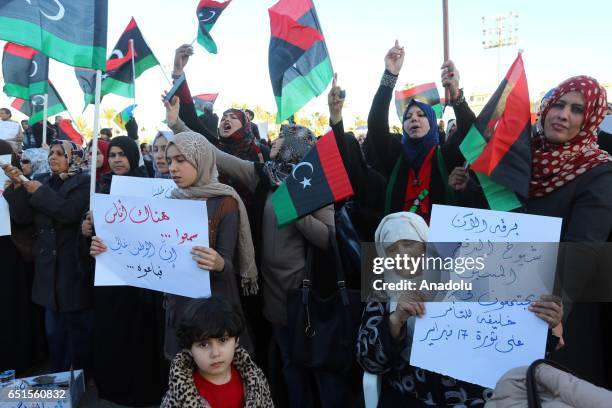 Libyans take part in a protest against operation named 'Dignity' held by Commander in the Libyan National Army Marshal Khalifa Haftar in Tripoli,...