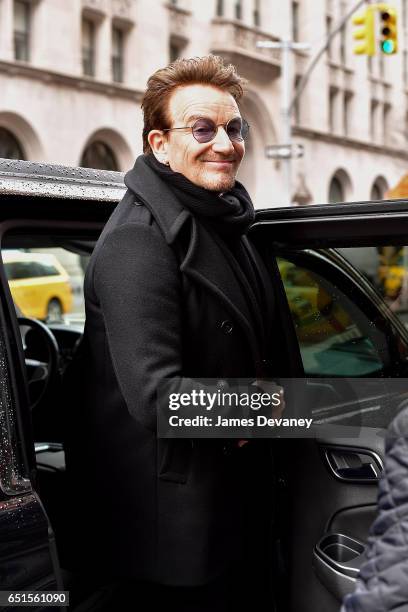 Bono leaves Upland restaurant on March 10, 2017 in New York City.